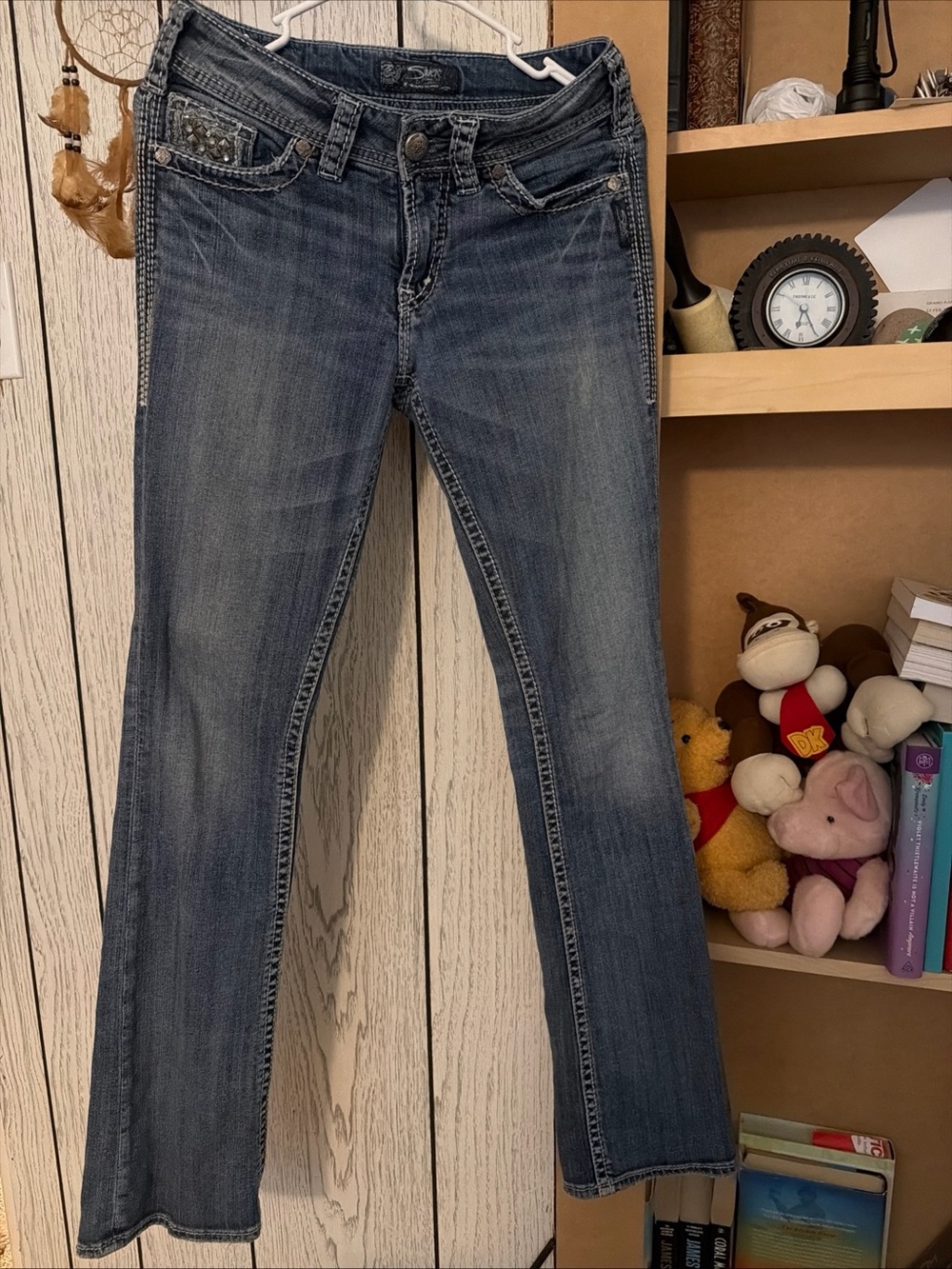 Silver Jeans Suki flap 17 Women's Faded Blue Bootcut with Subtle Distressing